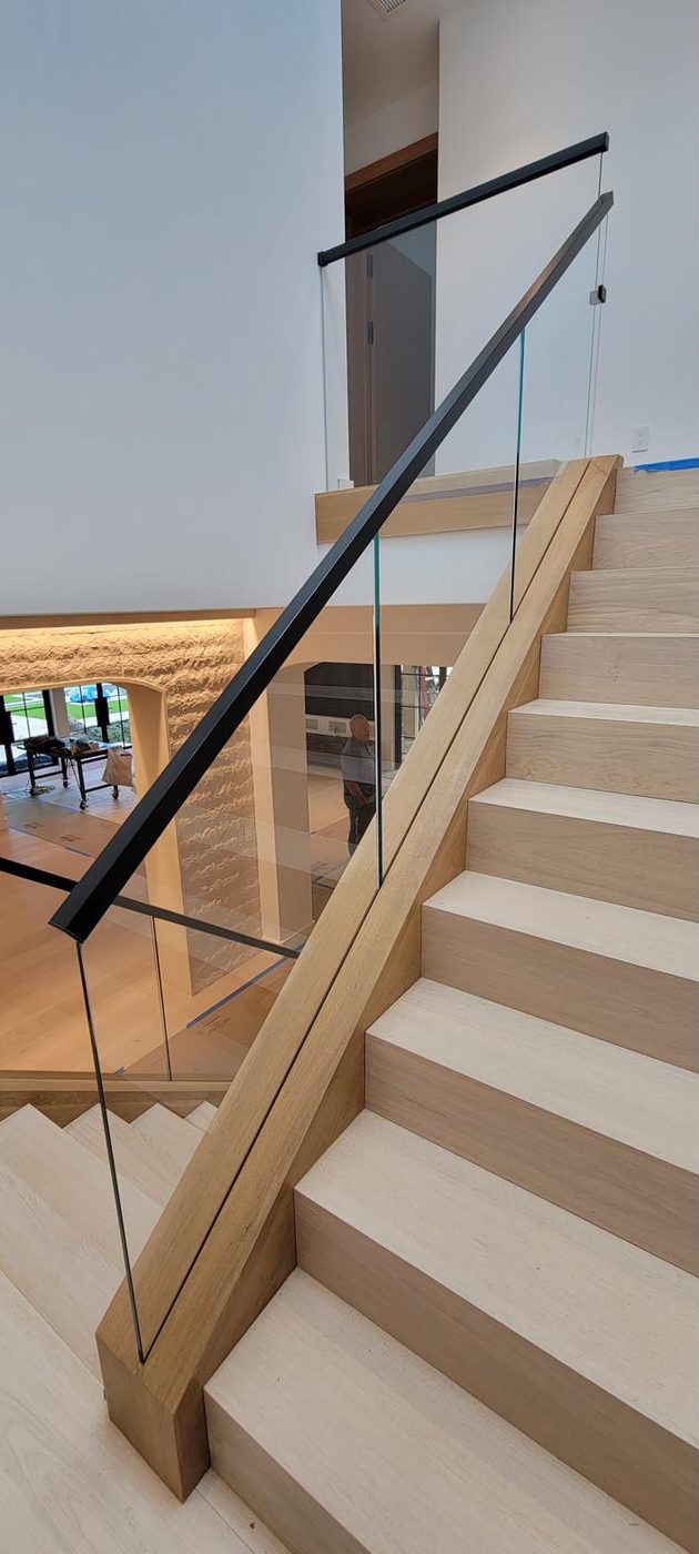 Oak staircase with frameless glass railing
