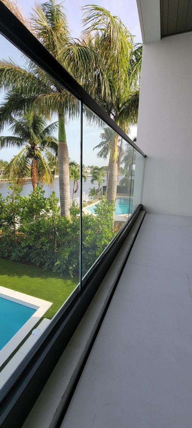 Staircase with frameless glass railing