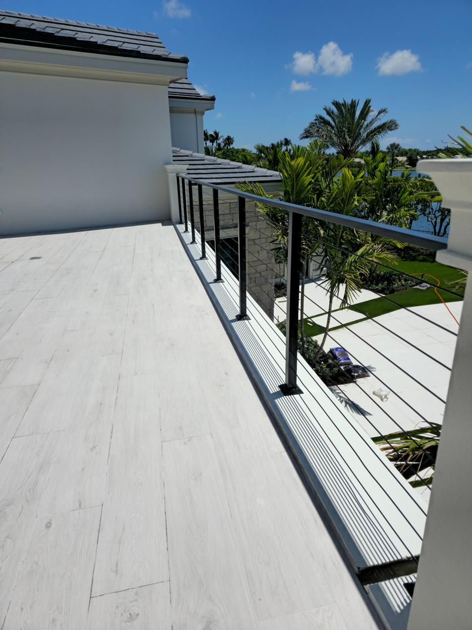 Cable railing on a waterfront terrace