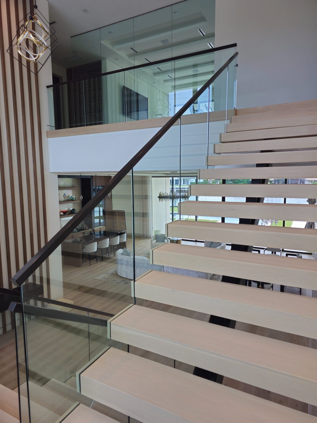 Floating staircase with glass railing