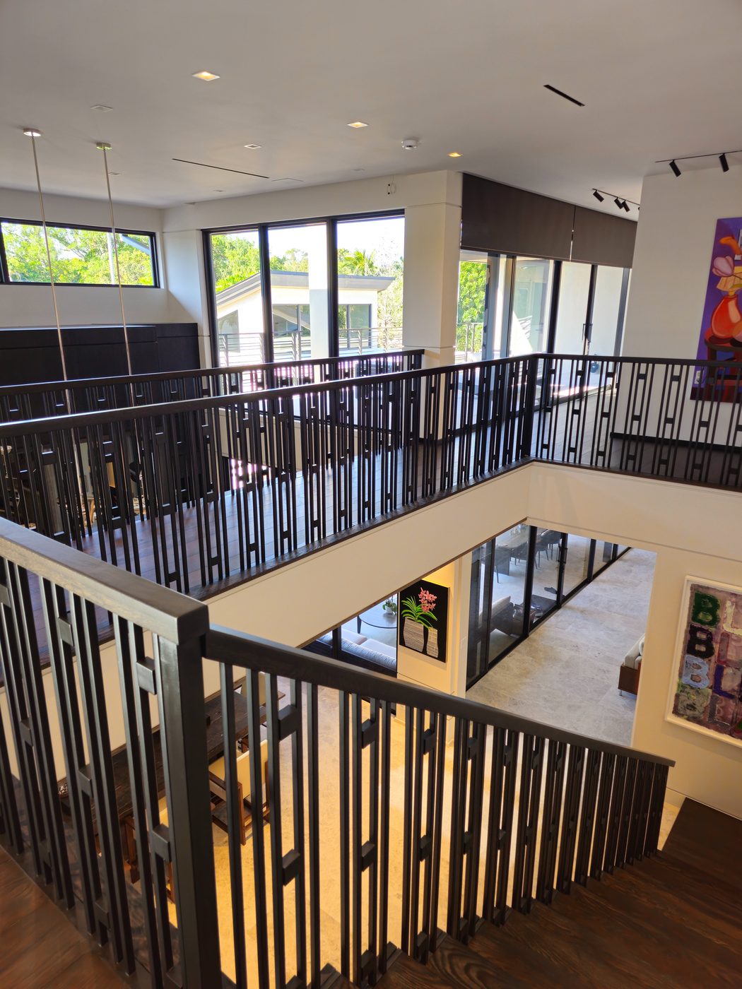 Floating staircase with decorative rod balustrade