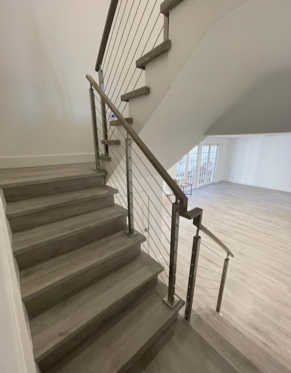 Staircase with stainless cable railing